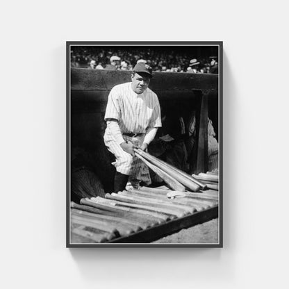 Babe Ruth Holding Bats