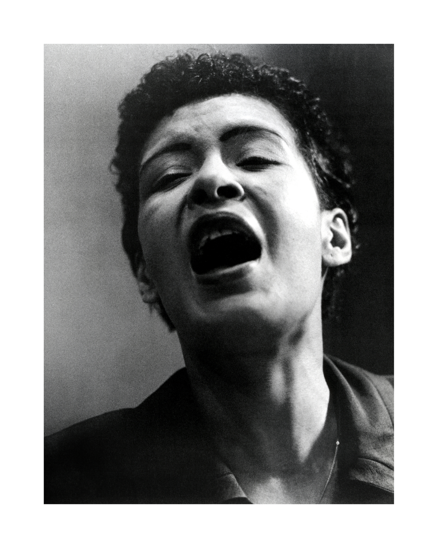 Johnny Cash joue de l'harmonica