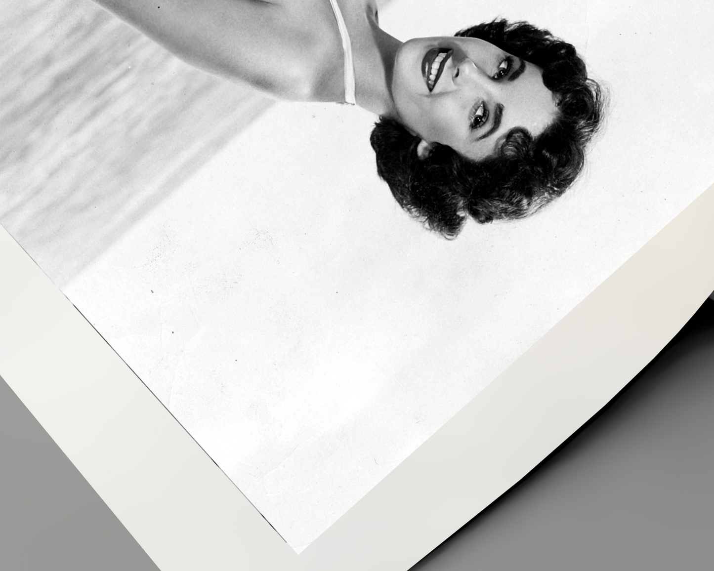 Elizabeth Taylor Kneeling on Beach