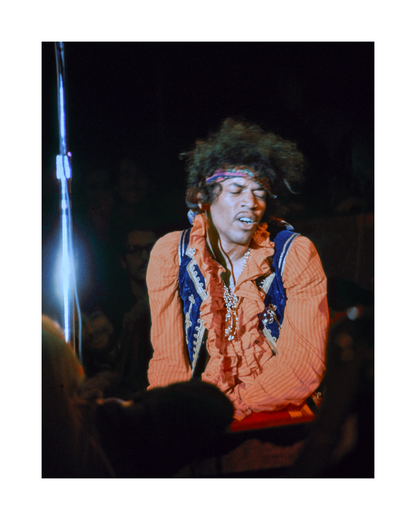 Jimi Hendrix Kneeling on Stage at Monterey Pop