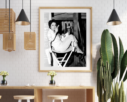 Liz Taylor Shooting Water Gun on the Set