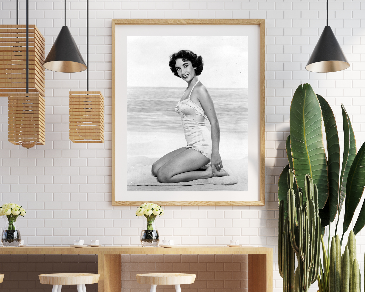 Elizabeth Taylor Kneeling on Beach