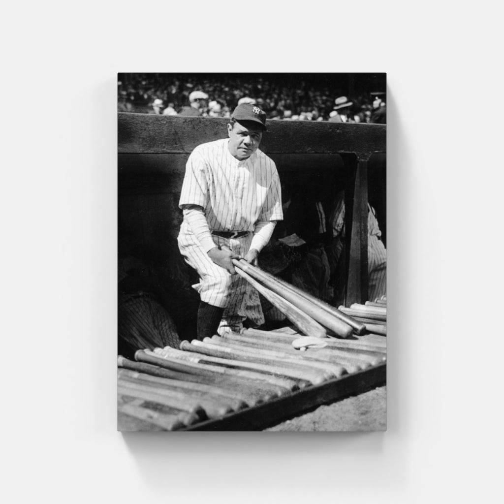 Babe Ruth Holding Bats