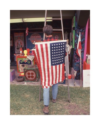 Hippie with Flag at Monterey Pop