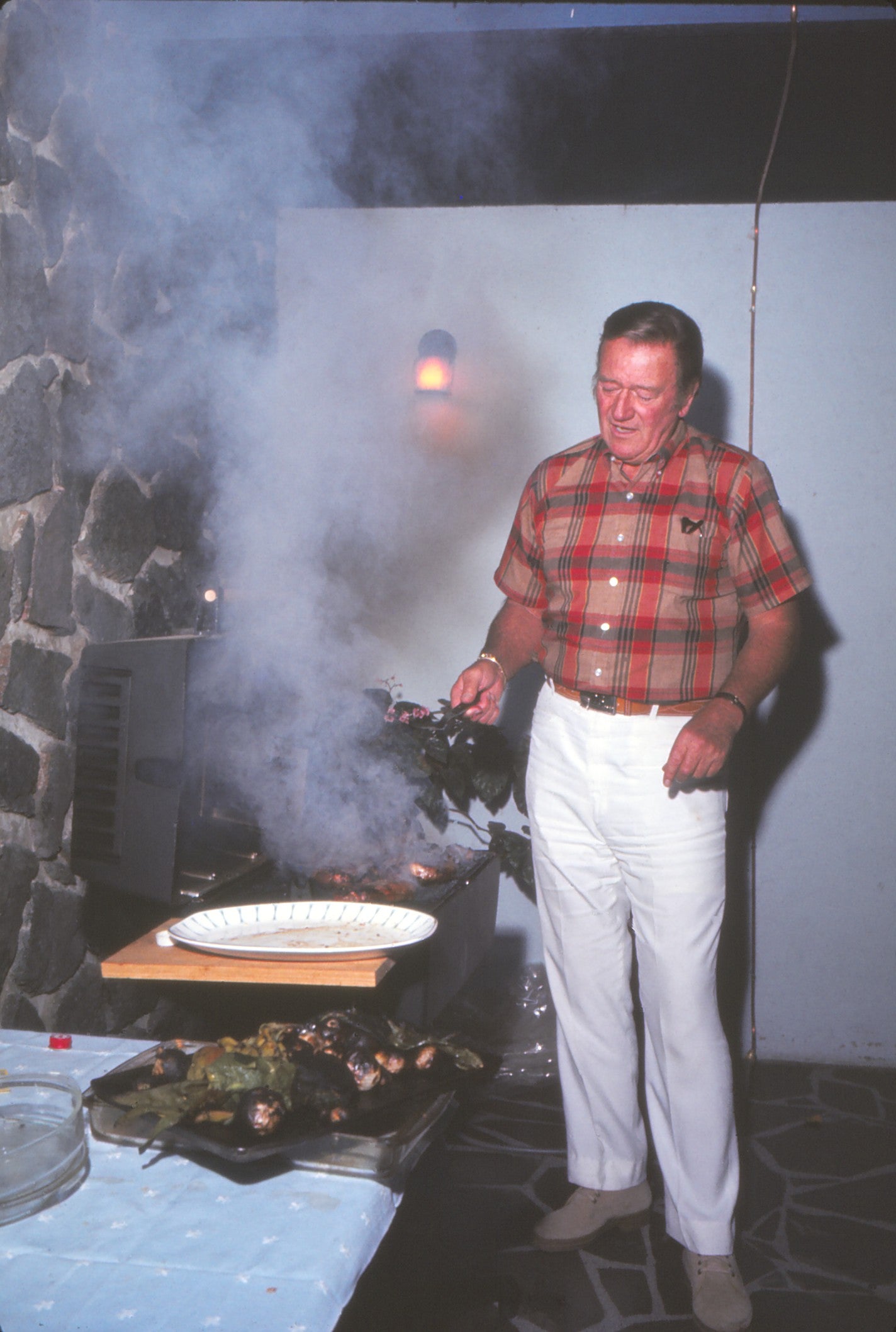 John Wayne Cooking on Grill