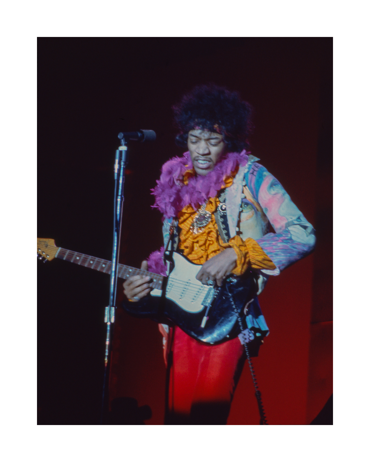 Jimi Hendrix in Purple Boa at Monterey Pop