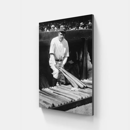 Babe Ruth Holding Bats