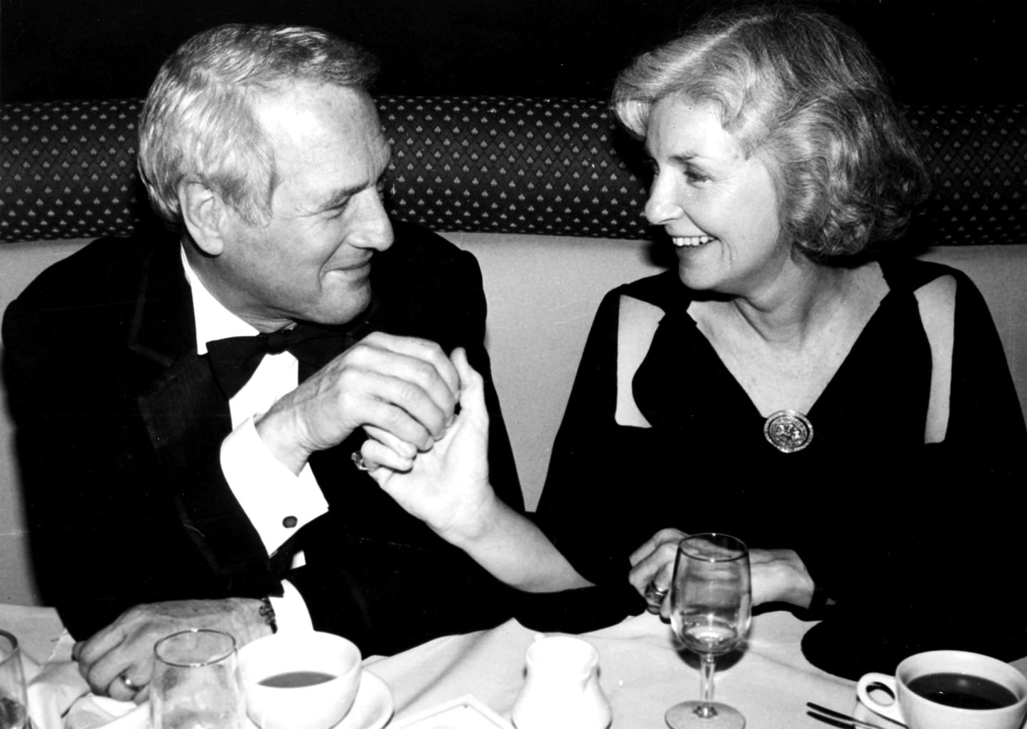 Paul Newman and Joanne Woodward at Dinner Table