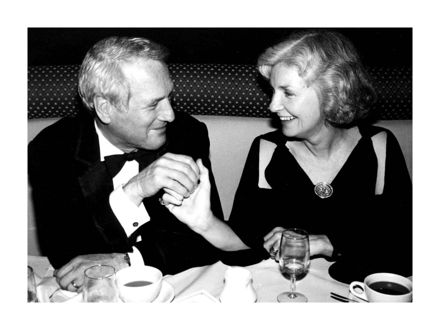 Paul Newman and Joanne Woodward at Dinner Table