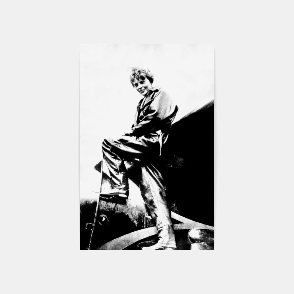 Amelia Earhart Climbing Into an Airplane