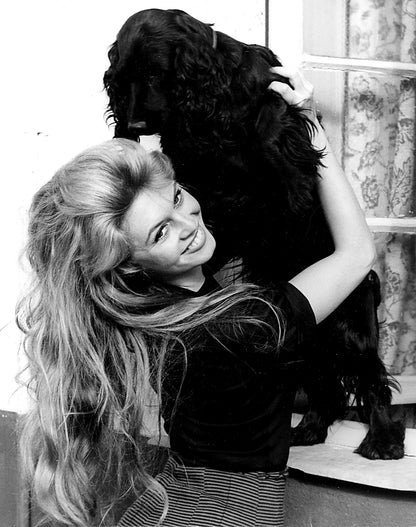 Brigitte Bardot Petting a Dog