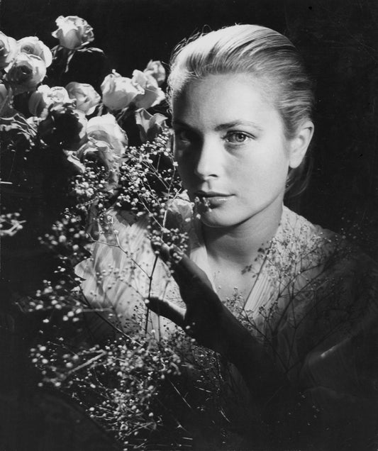 Grace Kelly Behind Flowers