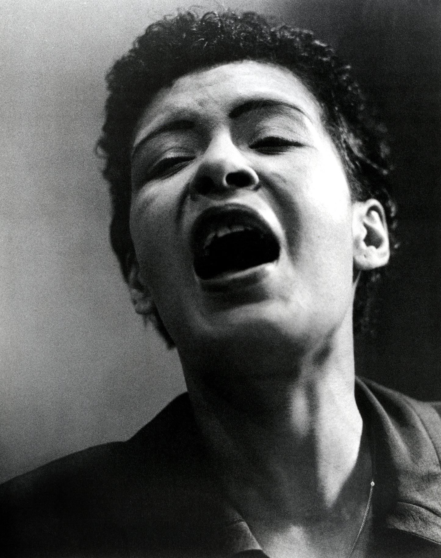 Johnny Cash joue de l'harmonica