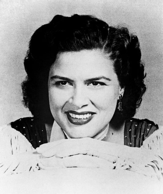 Johnny Cash joue de l'harmonica