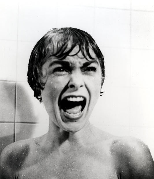 Johnny Cash joue de l'harmonica