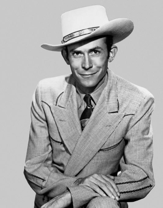 Johnny Cash joue de l'harmonica