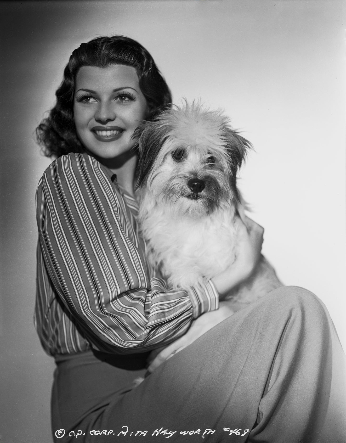 Rita Hayworth Posed with Dog