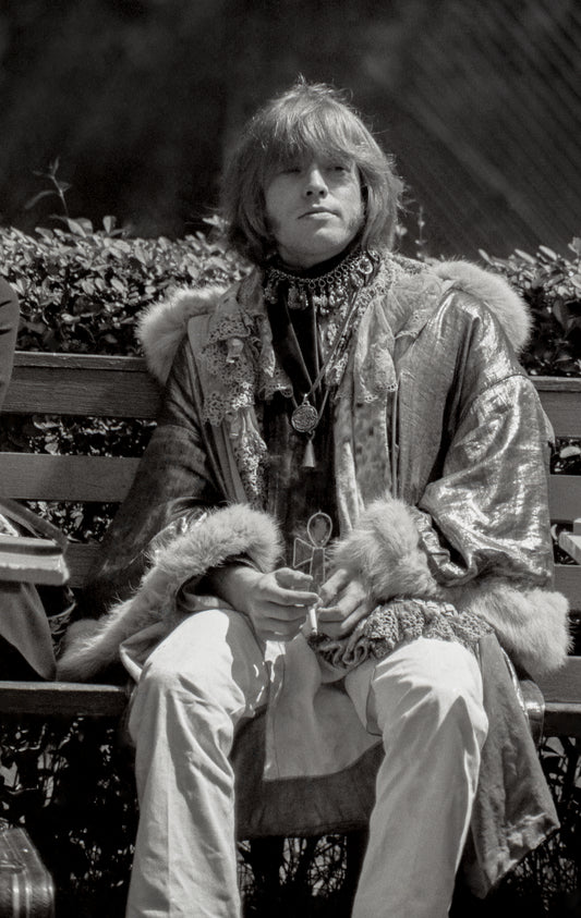 Brian Jones Sitting on Bench at Monterey Pop Festival