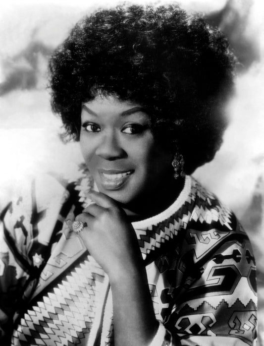 Johnny Cash joue de l'harmonica