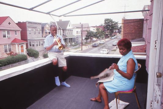 Louis Armstrong Playing on Balcony