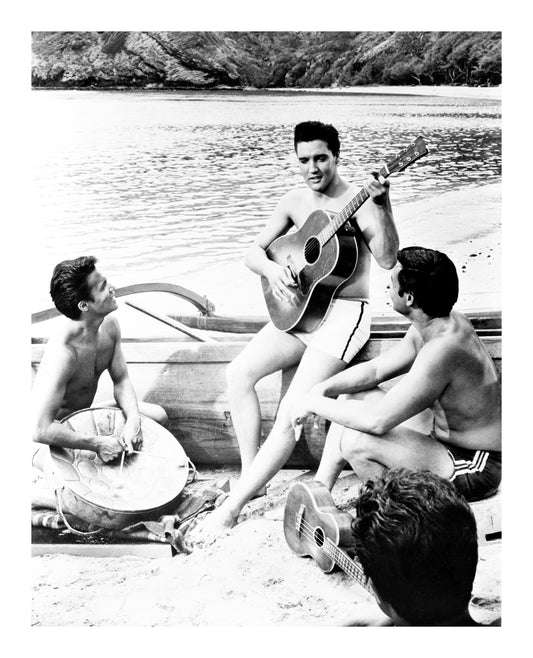 Elvis Presley Playing Guitar on Beach