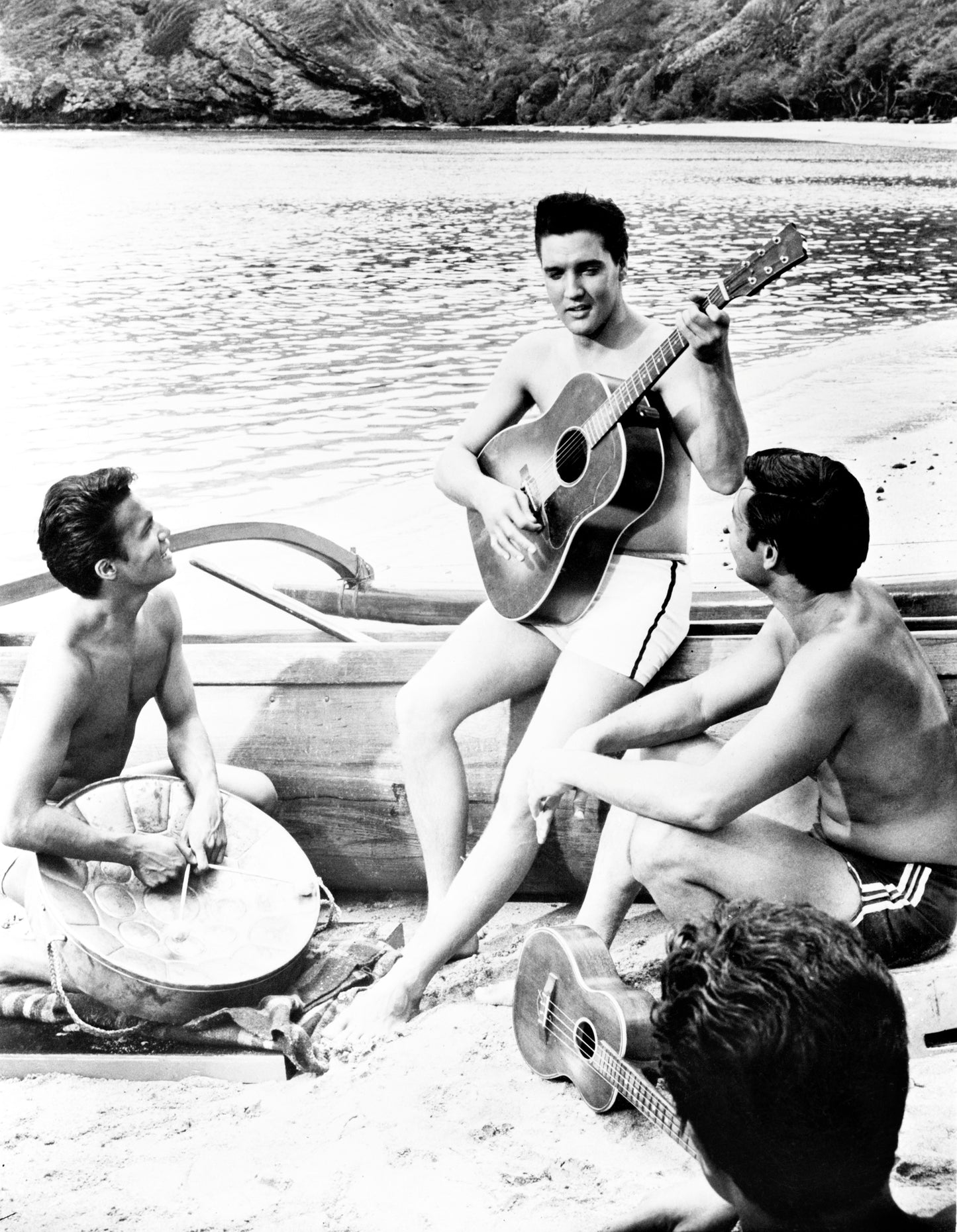 Elvis Presley Playing Guitar on Beach