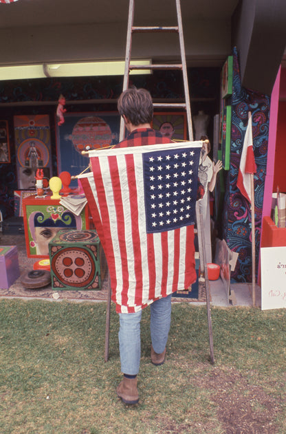Hippie with Flag at Monterey Pop