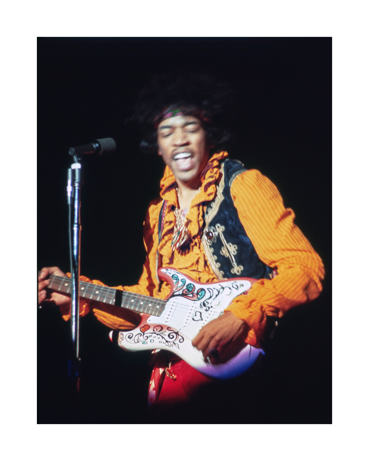 Jimi Hendrix Playing Guitar on Stage