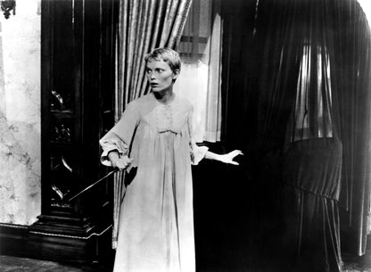 Johnny Cash joue de l'harmonica