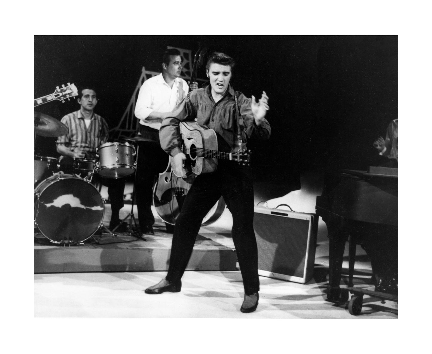 Elvis Presley Performing on Stage