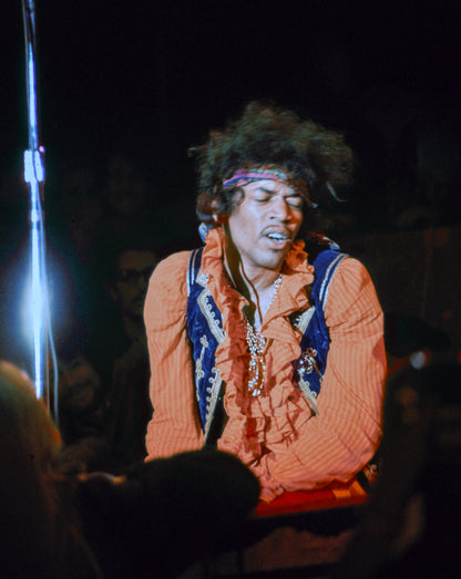 Jimi Hendrix Kneeling on Stage at Monterey Pop