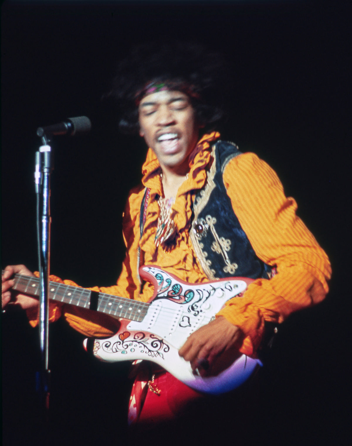 Jimi Hendrix Playing Guitar on Stage