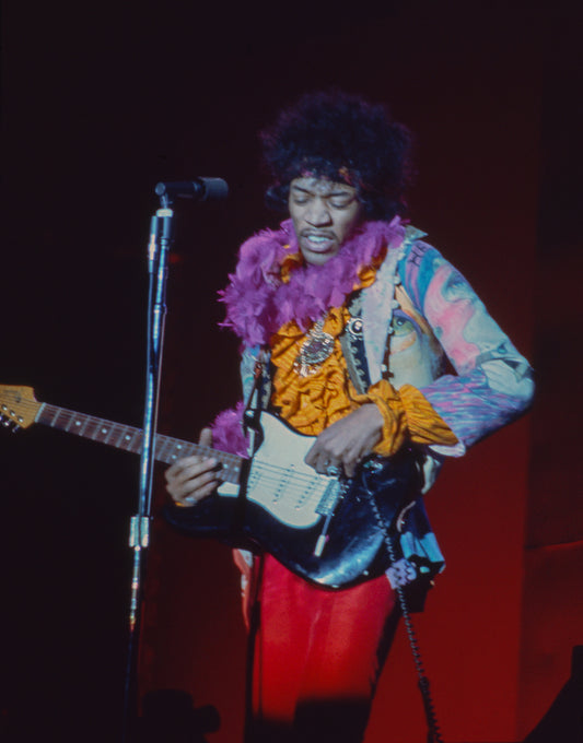 Jimi Hendrix in Purple Boa at Monterey Pop