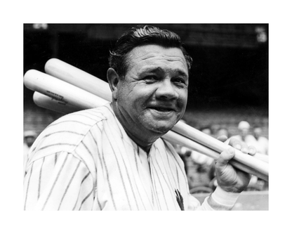 Babe Ruth avec des battes de baseball