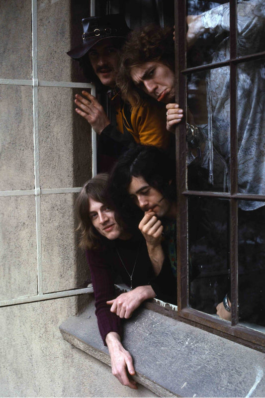 Led Zeppelin Leaning out of a Window